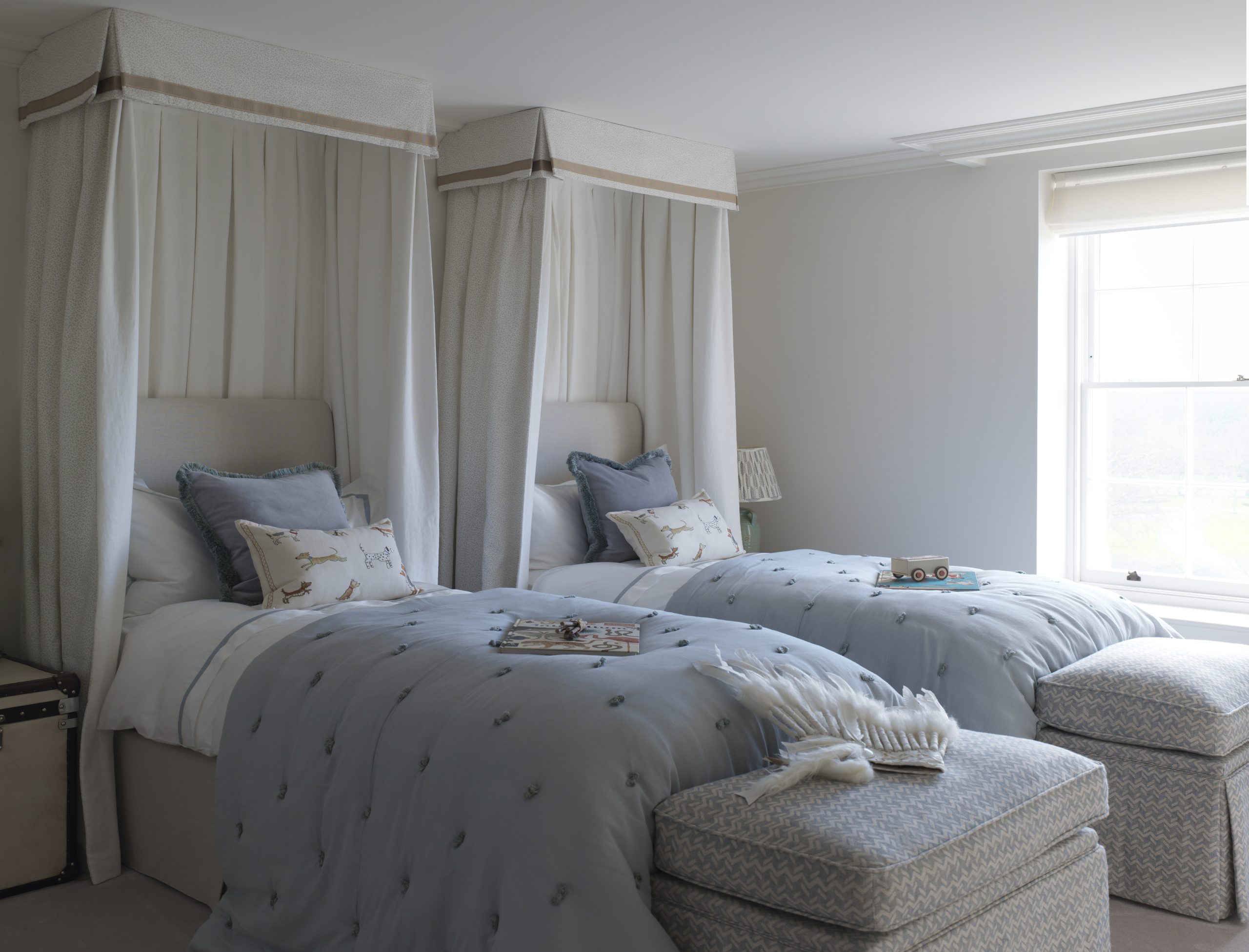 Symmetrical Serenity with Fabric Canopies and Blue Tones