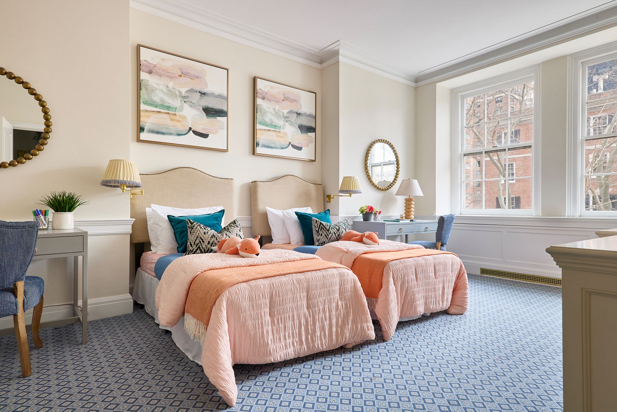 Vibrant Twin Bedroom with Geometric Carpet and Individual Desks