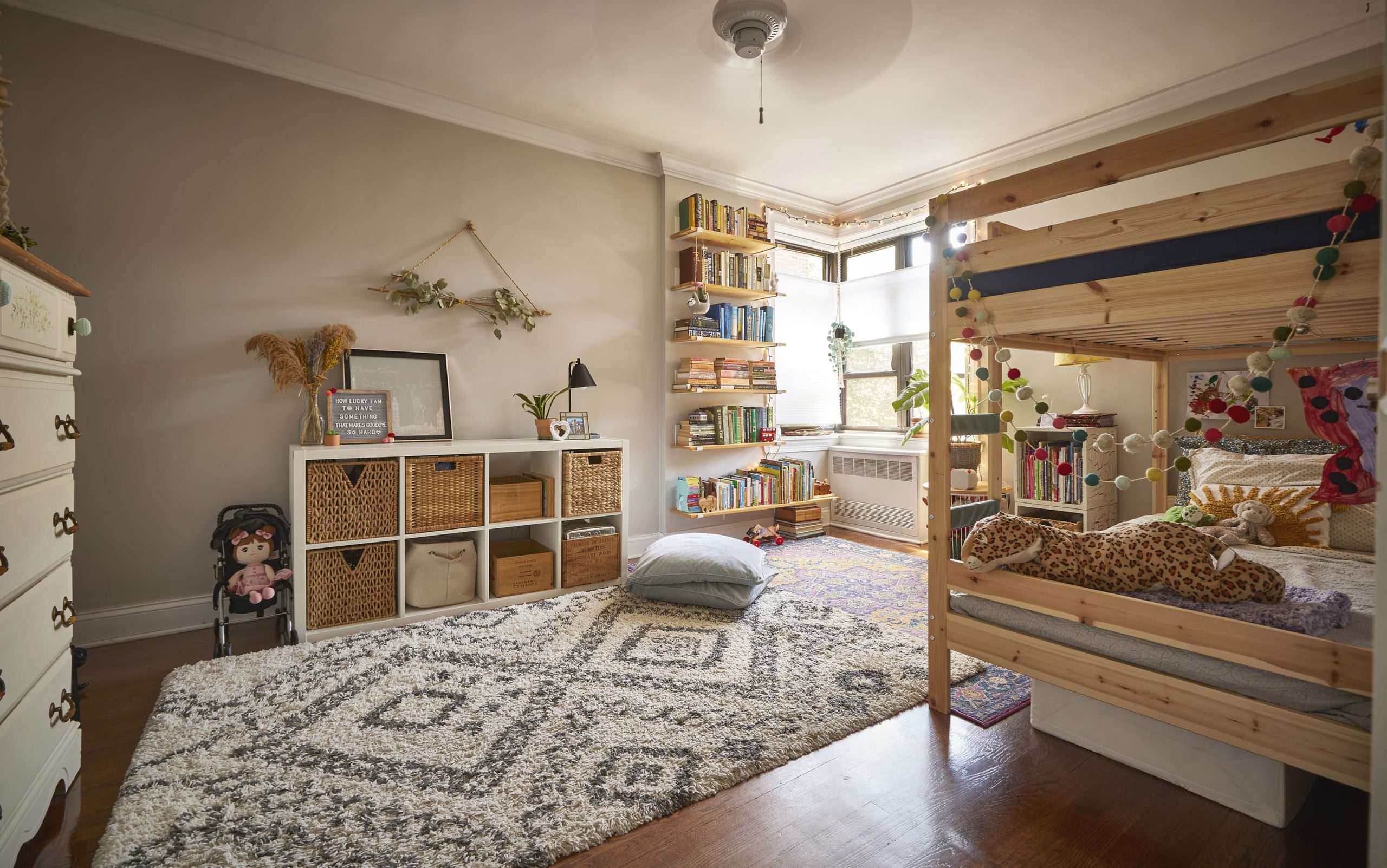Cozy Shared Kids' Bedroom with Bunk Beds, Storage, and Reading Nook