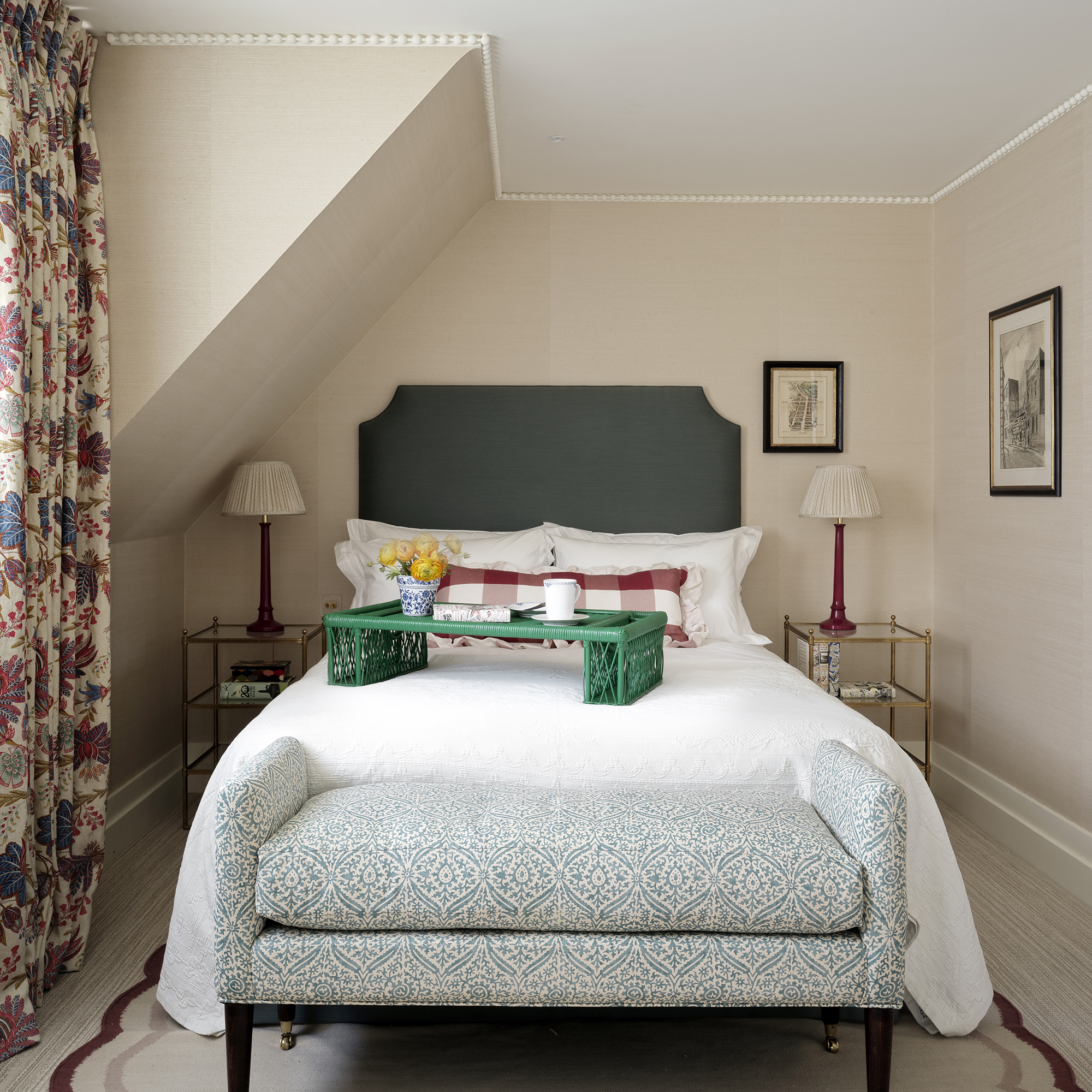 Cozy Attic Bedroom with Patterned Textiles and Textured Walls
