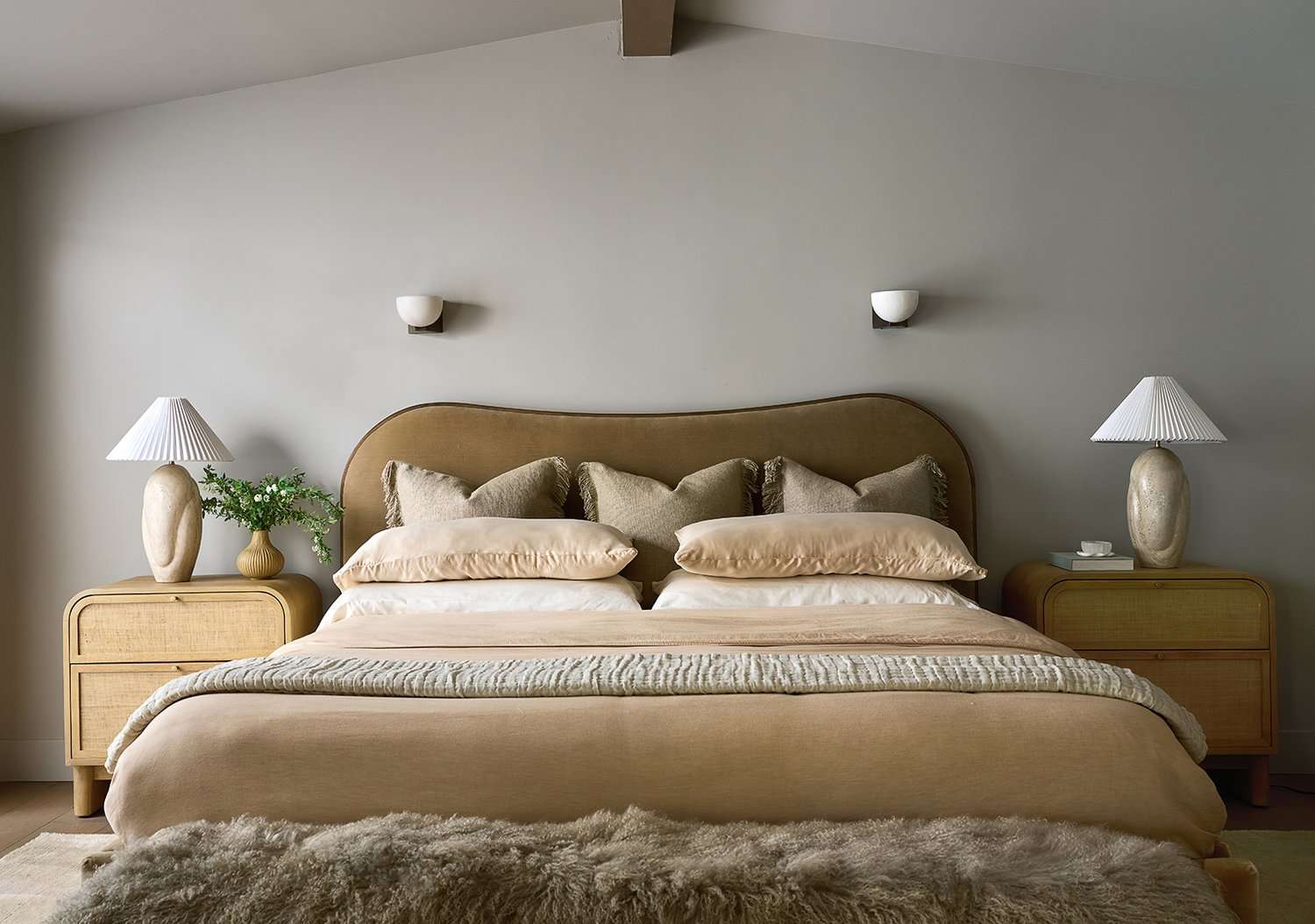 Bedroom with Integrated White Closet System and Light Wood Floor