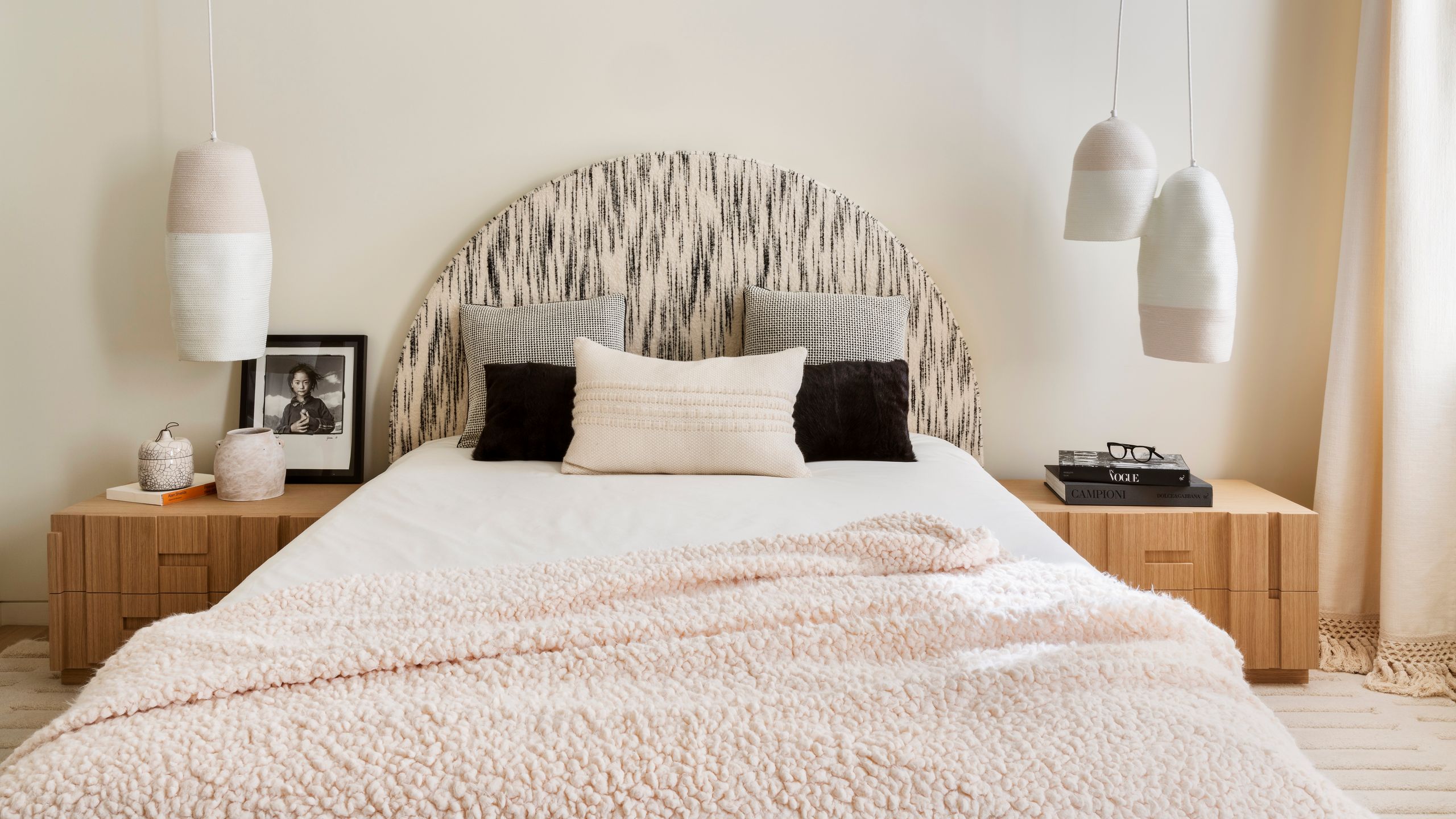 Modern Neutral Bedroom with Abstract Headboard and Pendant Lights