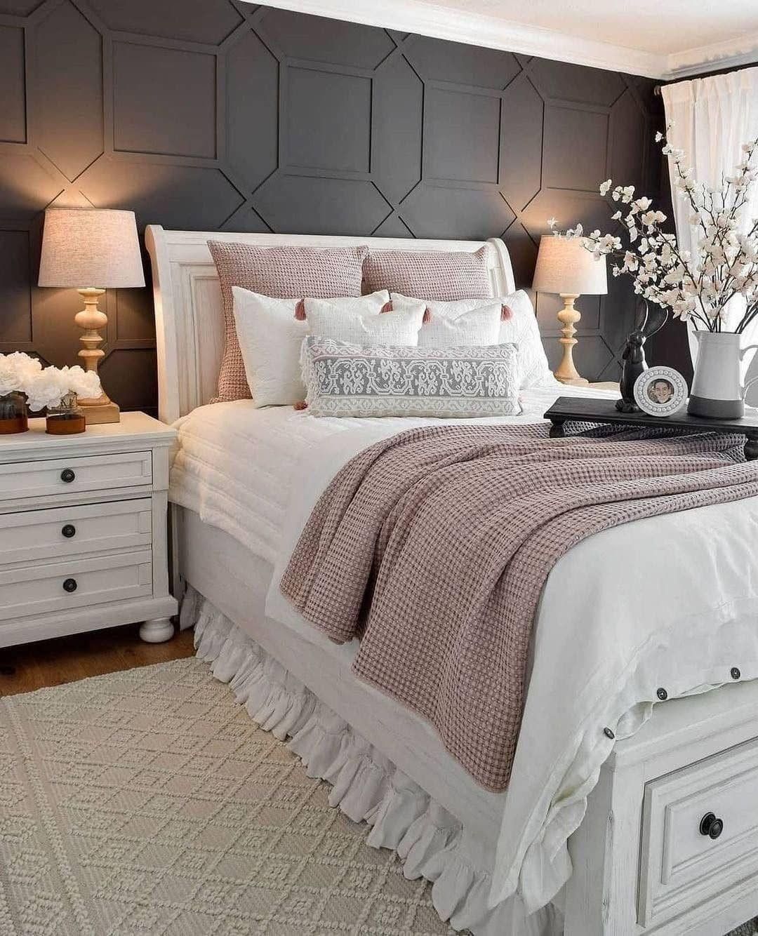 White and Blush Bed with Dark Geometric Accent Wall