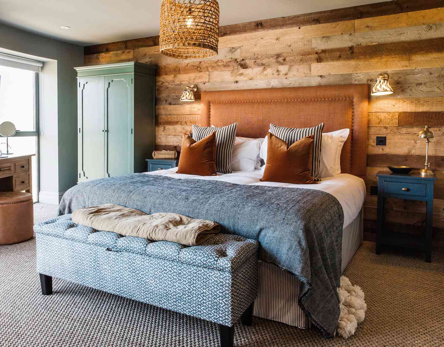 15. Distressed Wood Wall & Eclectic Comfort