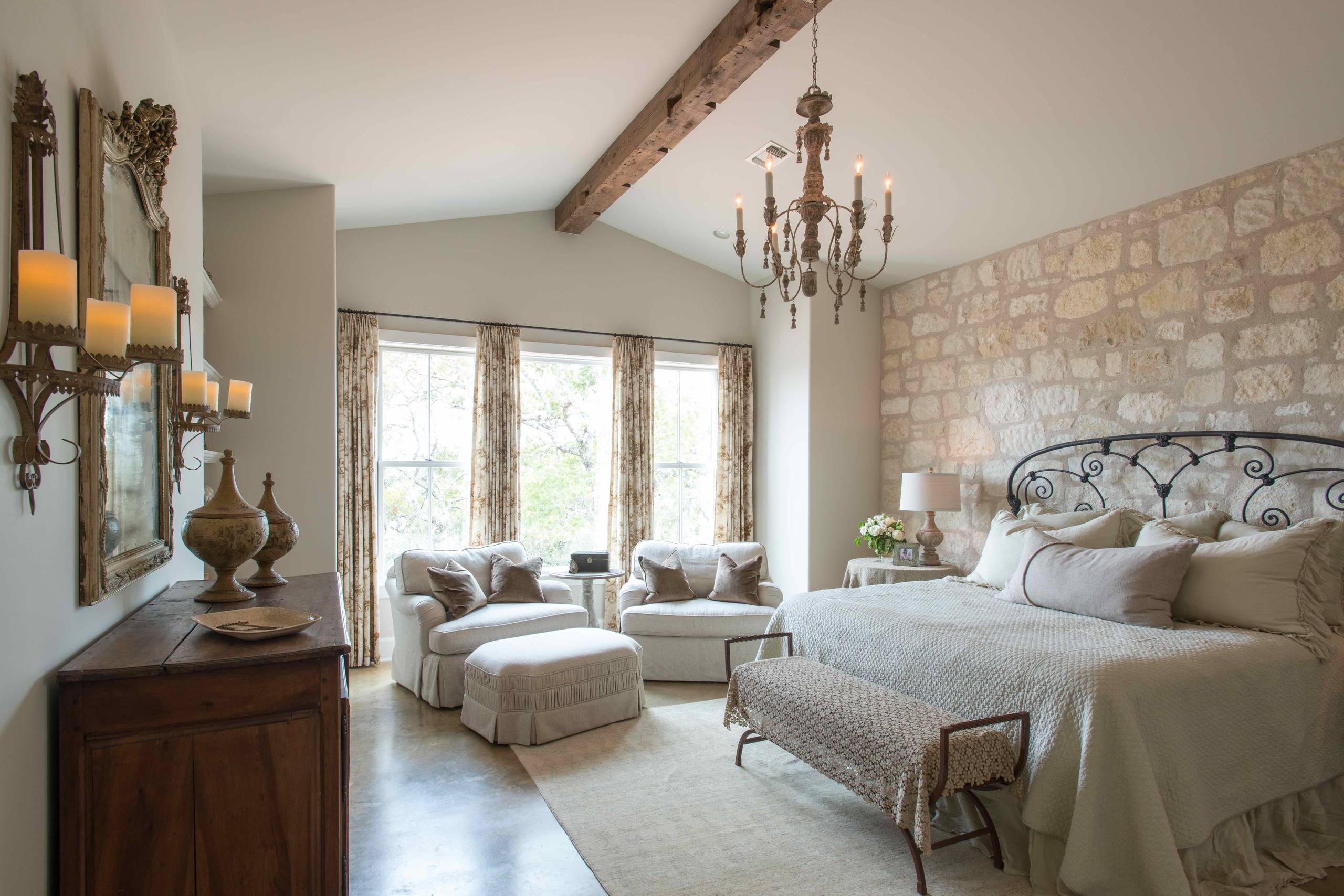 22. Stone Wall, Wood Beam, & Floral Drapes