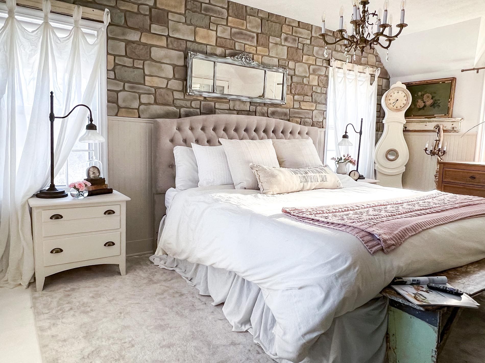 10. Stone Wall Shabby Chic with Tufted Headboard Charm