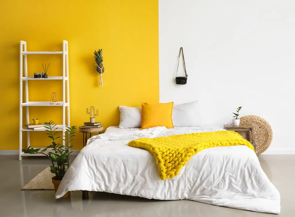 Split Yellow and White Wall Bedroom with Minimalist Decor